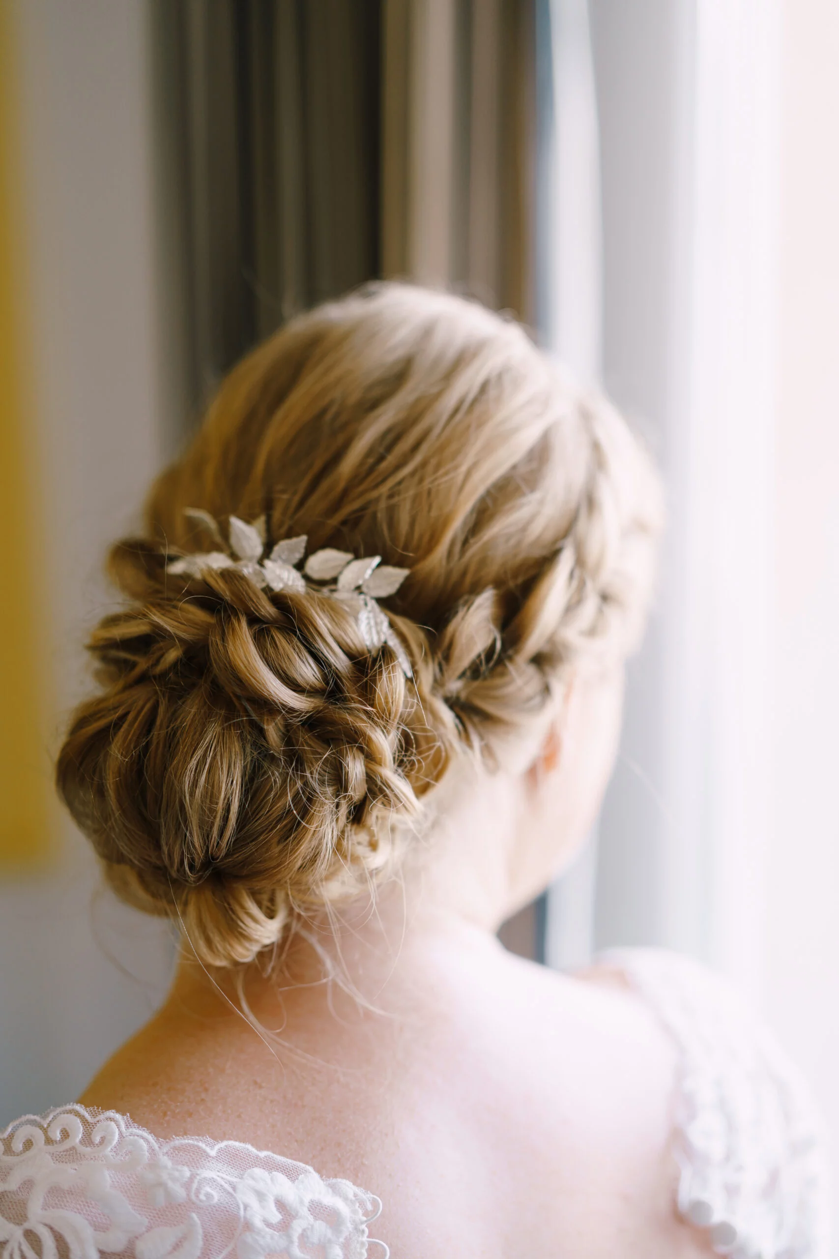 wedding hairstyle of the bride on long hair close